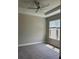 Bright bedroom with ceiling fan and carpet at 4734 Tortona Ct, Bradenton, FL 34211