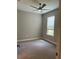Simple bedroom with ceiling fan and carpet at 4734 Tortona Ct, Bradenton, FL 34211