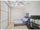 Bedroom with built-in desk and sliding doors at 4734 Tortona Ct, Bradenton, FL 34211
