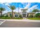 Modern community building with palm trees and landscaping at 4734 Tortona Ct, Bradenton, FL 34211