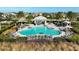 Community pool with lounge chairs and a covered pavilion at 4734 Tortona Ct, Bradenton, FL 34211
