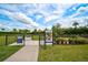 Entrance to the community dog park with signage at 4734 Tortona Ct, Bradenton, FL 34211