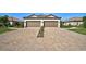 Two-car garage with paver driveway at 4734 Tortona Ct, Bradenton, FL 34211