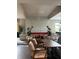 Comfortable lounge area with modern seating and a unique fireplace at 4734 Tortona Ct, Bradenton, FL 34211