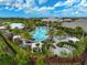 Community pool with lounge chairs and cabanas at 4734 Tortona Ct, Bradenton, FL 34211