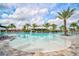 Expansive resort-style pool with a shallow entry and a swim-up bar at 4734 Tortona Ct, Bradenton, FL 34211