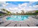 Resort-style pool with lap lanes and plenty of lounge chairs at 4734 Tortona Ct, Bradenton, FL 34211