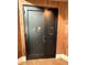 Elegant door to the wine room, featuring wine glass etching at 4734 Tortona Ct, Bradenton, FL 34211