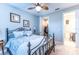 Guest bedroom with ceiling fan and ensuite bathroom at 4747 Motta Ct, Bradenton, FL 34211