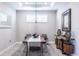 Elegant dining room featuring a rustic wood table at 4747 Motta Ct, Bradenton, FL 34211