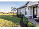 Landscaped yard and walkway leading to the front door at 4747 Motta Ct, Bradenton, FL 34211