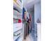 Bright walk-in closet with custom shelving and rod at 4747 Motta Ct, Bradenton, FL 34211