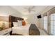 Spacious bedroom with a king-size bed and direct access to a private patio at 5610 Avenida Del Mare, Sarasota, FL 34242