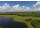 Aerial view of golf course near the water at 7914 Grand Estuary Trl # 102, Bradenton, FL 34212