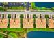 Aerial view of townhouses with lake access at 7914 Grand Estuary Trl # 102, Bradenton, FL 34212