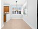 Dining area with tile floors and wood cabinets at 7914 Grand Estuary Trl # 102, Bradenton, FL 34212