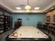 Relaxing game room with a pool table and comfortable seating at 7914 Grand Estuary Trl # 102, Bradenton, FL 34212