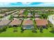 Aerial view of community, showcasing homes and landscape at 11192 Whimbrel Ln, Sarasota, FL 34238