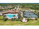 Community features a clubhouse with pool and tennis courts at 11192 Whimbrel Ln, Sarasota, FL 34238
