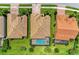 Aerial view of homes with tile roofs and lush landscaping at 11192 Whimbrel Ln, Sarasota, FL 34238