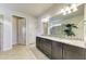 Elegant bathroom with double vanity and granite countertops at 11192 Whimbrel Ln, Sarasota, FL 34238