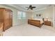 Large bedroom with carpeted floors and plenty of closet space at 11192 Whimbrel Ln, Sarasota, FL 34238