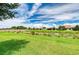 Luxury homes community with pond and lush landscaping at 11192 Whimbrel Ln, Sarasota, FL 34238