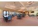 Community room with tables and chairs for gatherings at 11192 Whimbrel Ln, Sarasota, FL 34238