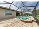 Inviting pool and spa with screened enclosure at 11192 Whimbrel Ln, Sarasota, FL 34238