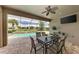 Screened-in pool area with patio furniture and beautiful views at 11192 Whimbrel Ln, Sarasota, FL 34238