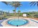 Community hot tub with surrounding landscaping at 11192 Whimbrel Ln, Sarasota, FL 34238