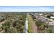 Aerial view of a canal running through a residential neighborhood at 1478 Navigator Rd, Punta Gorda, FL 33983
