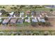 Aerial view of a row of homes near a golf course at 1478 Navigator Rd, Punta Gorda, FL 33983