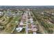 Aerial view of a residential street with golf course views at 1478 Navigator Rd, Punta Gorda, FL 33983