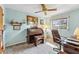 Home office with organ, comfortable chair, and ample natural light at 1478 Navigator Rd, Punta Gorda, FL 33983