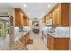 View of kitchen with granite countertops and appliances at 1478 Navigator Rd, Punta Gorda, FL 33983