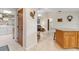 Kitchen island and partial view of living room and laundry at 1478 Navigator Rd, Punta Gorda, FL 33983