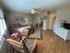 Bright bedroom with queen bed and built-in mirrored closet at 919 Sunridge Dr # 919, Sarasota, FL 34234