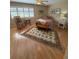 Spacious bedroom with a queen-size bed and a relaxing rocking chair at 919 Sunridge Dr # 919, Sarasota, FL 34234