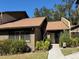 Exterior view of a charming condo with a walkway and landscaping at 919 Sunridge Dr # 919, Sarasota, FL 34234