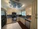 Modern kitchen featuring stainless steel appliances and granite countertops at 919 Sunridge Dr # 919, Sarasota, FL 34234