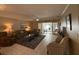 Living room with access to a patio, comfortable seating, and tile floors at 919 Sunridge Dr # 919, Sarasota, FL 34234