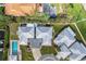 Aerial view showing home's layout, pool, and landscaping at 115 Villa Dr # 115, Osprey, FL 34229