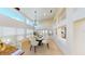 Dining area staged with table and chairs, offering natural light at 4028 Mira Lago Dr, Sarasota, FL 34238