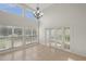 Sunlit dining area featuring French doors and tile floors at 4028 Mira Lago Dr, Sarasota, FL 34238