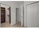 Bright hallway with access to closet and bathroom at 4028 Mira Lago Dr, Sarasota, FL 34238