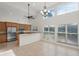 Kitchen with wood cabinets, granite counters, and stainless steel appliances at 4028 Mira Lago Dr, Sarasota, FL 34238