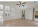 Light-filled living room with high ceilings and tile flooring at 4028 Mira Lago Dr, Sarasota, FL 34238