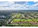 Aerial view of community near golf course at 6241 Timberlake Dr # D7, Sarasota, FL 34243