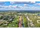 Aerial view of community with villas and golf course at 6241 Timberlake Dr # D7, Sarasota, FL 34243